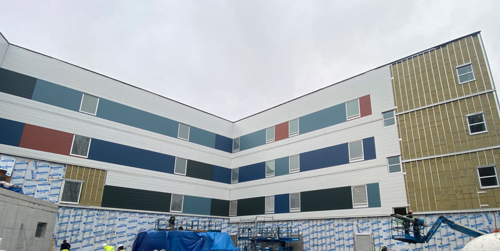 Red Fish Healing Centre siding under construction