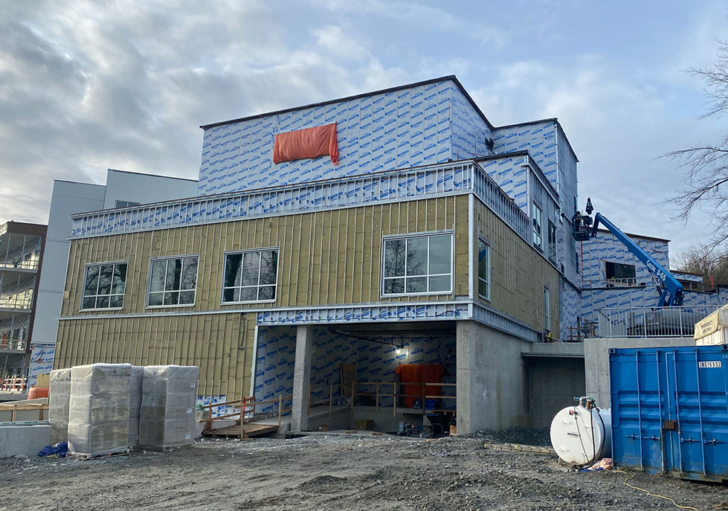 Red Fish Healing Centre siding under construction
